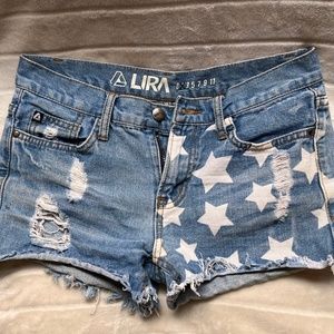 Lira star design mid rise cut off shorts